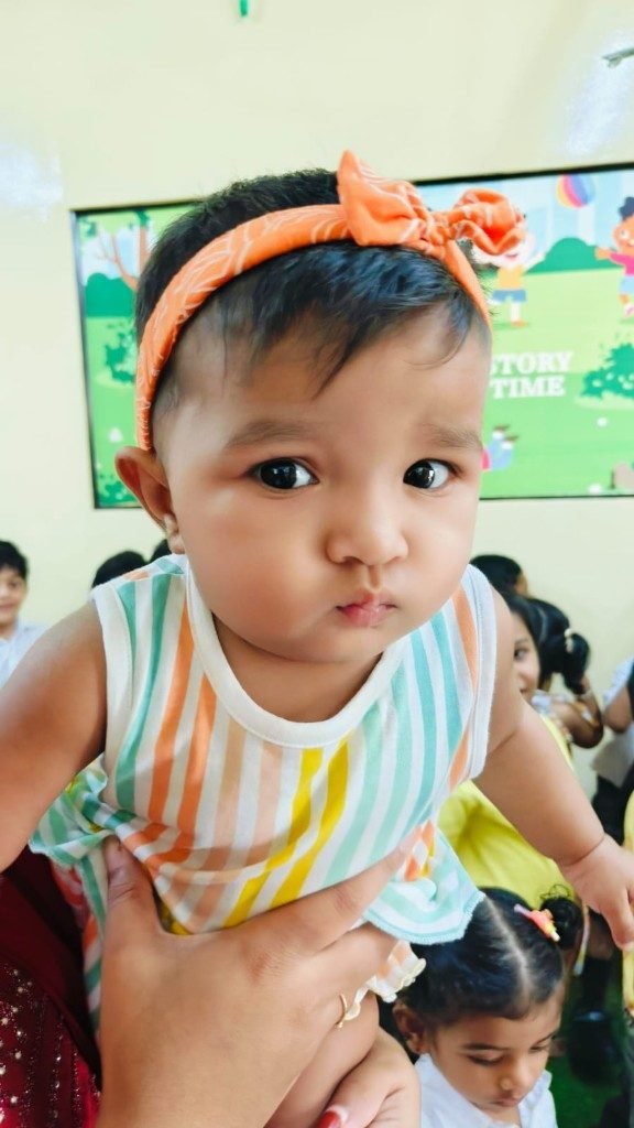 Infant portrait during story time in a nurturing classroom